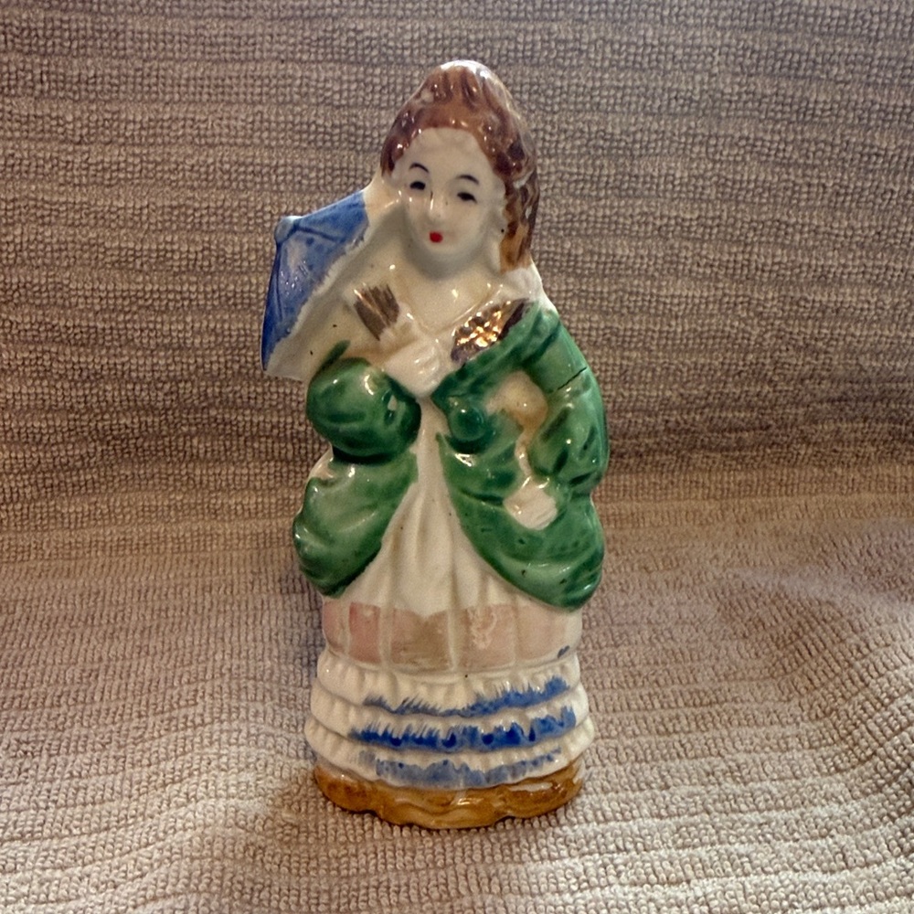 Vintage porcelain Victorian Figurine with Green Dress. Made in Japan